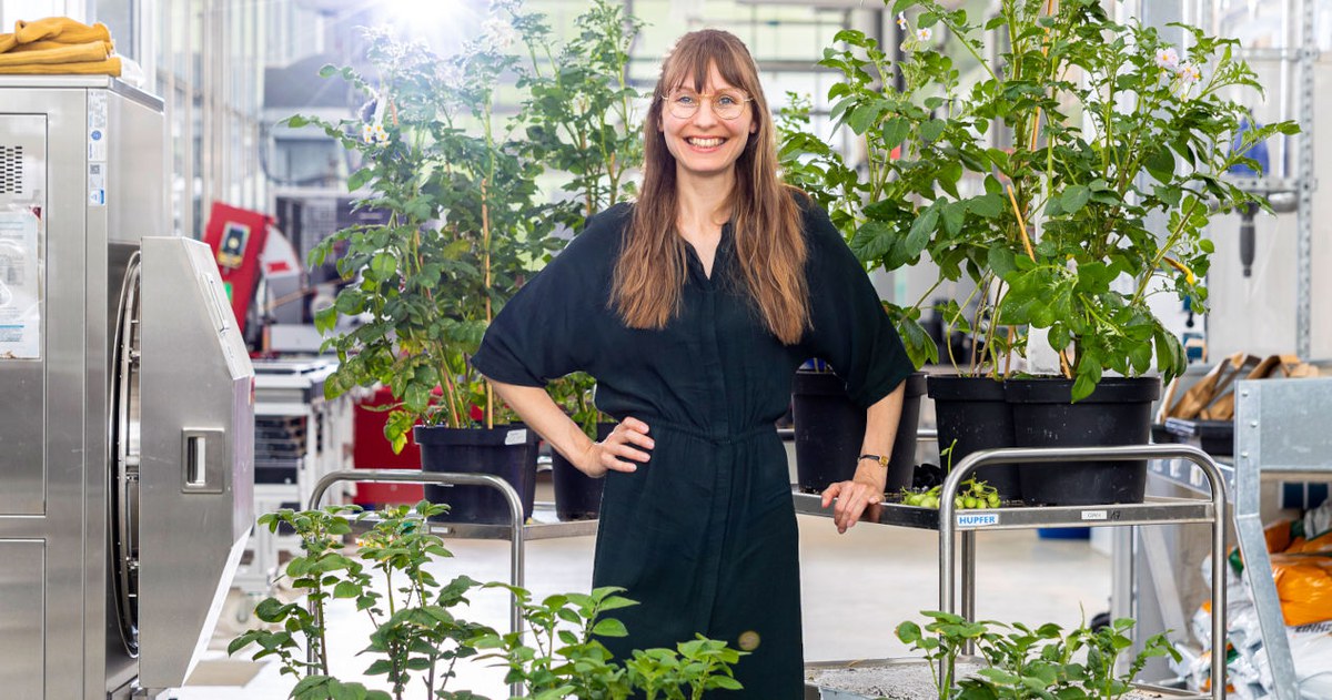 Franziska Genzel with potato plants