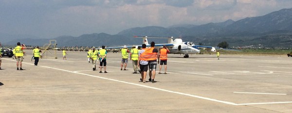 high-visibility-vests are requested on the apron. A shortage of vests can lead to collegues sharing one ;)