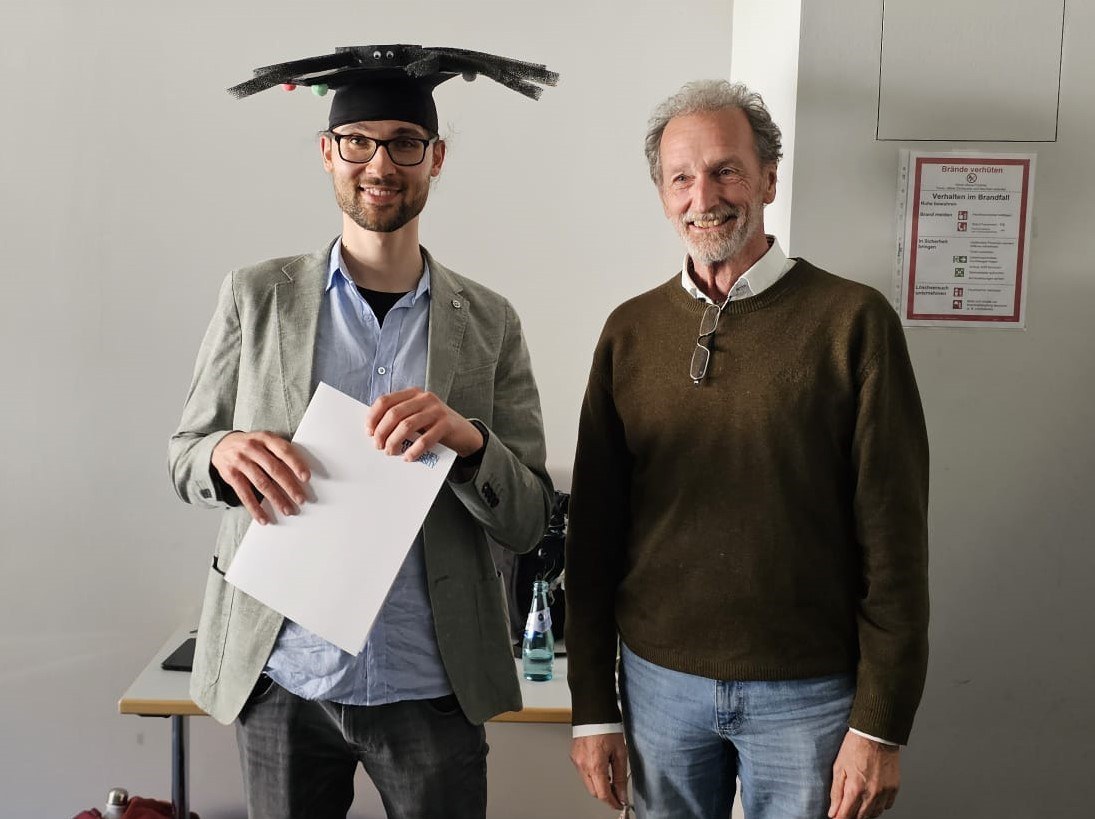 Justus Bednar successfully defended his Ph.D.