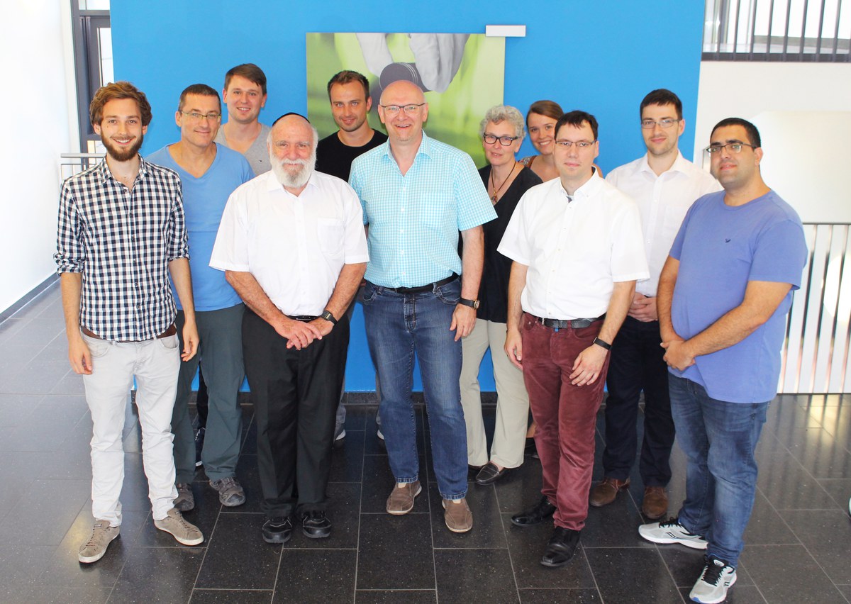 Picture of  Prof. Dr. Doron Aurbach with Prof. Dr. Martin Winter and colleagues from Israel and Germany