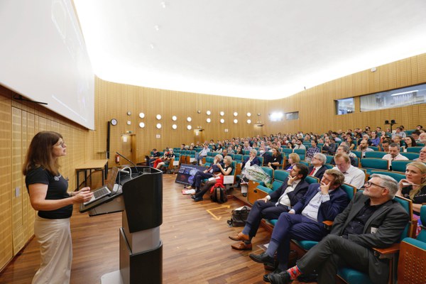 Katrin Amunts speaking in front of a crowd